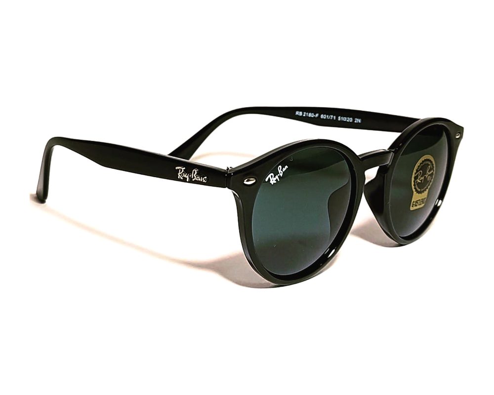 Lentes de sol Redondo negro: redondo de acetato con mica verde